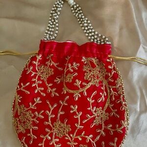 Embroidered hand satchel w/ beaded handle